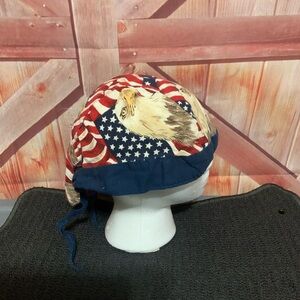 Patriotic Eagle stars and stripes skull cap. Sweat band inside. Gently worn.